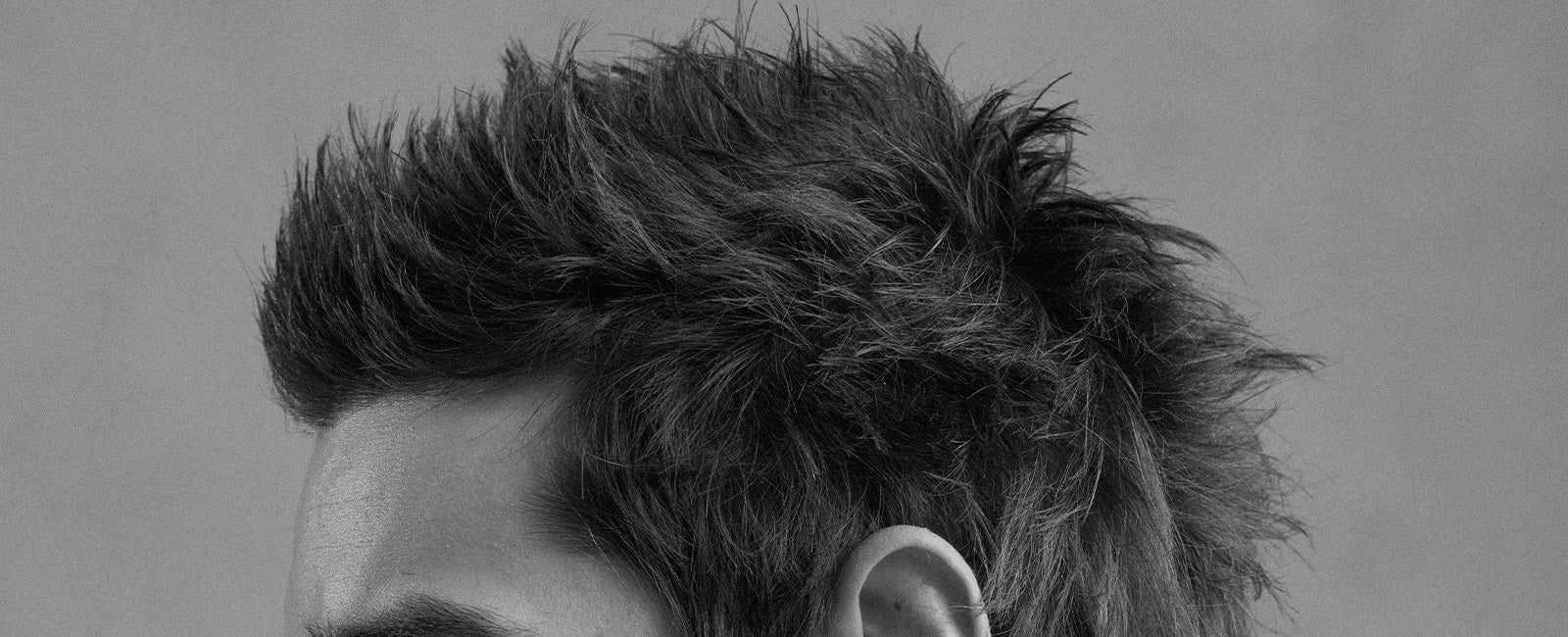 Man with a textured mullet hair style